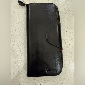 Elegant Black Leather Wallet by Indigo